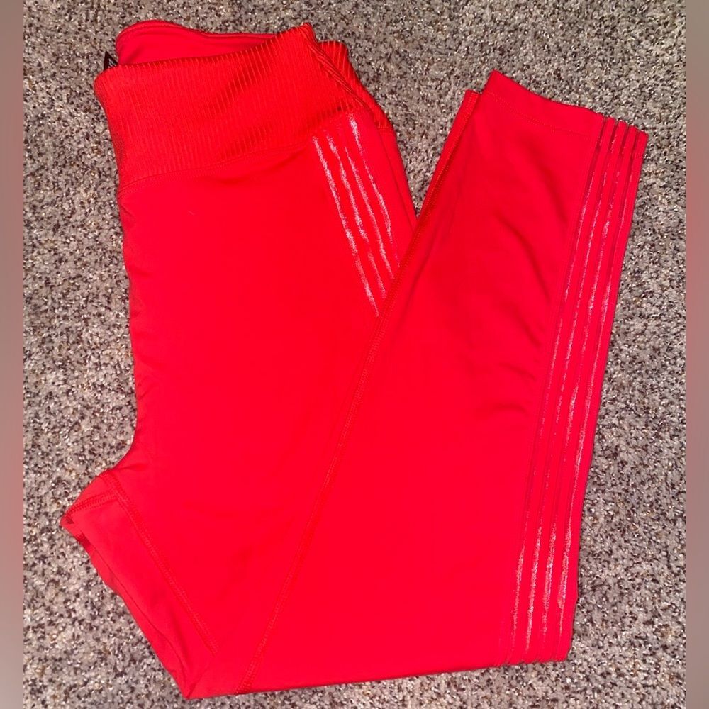 Victoria's Secret Ultimate orange See-thru on outside of legs, Sz large Leggings
